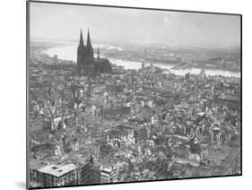 Aerial View of Cologne Showing Devastation of Allied Air Raids, Cathedral and Rhine River-John Florea-Mounted Photographic Print