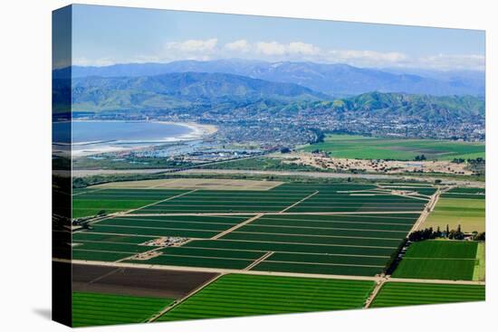 Aerial view of Oxnard farm fields in spring with Ventura City and Pacific Ocean in background, V...-null-Stretched Canvas