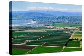 Aerial view of Oxnard farm fields in spring with Ventura City and Pacific Ocean in background, V...-null-Stretched Canvas