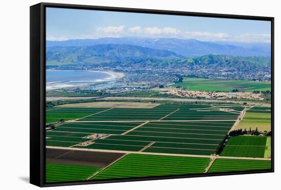 Aerial view of Oxnard farm fields in spring with Ventura City and Pacific Ocean in background, V...-null-Framed Stretched Canvas