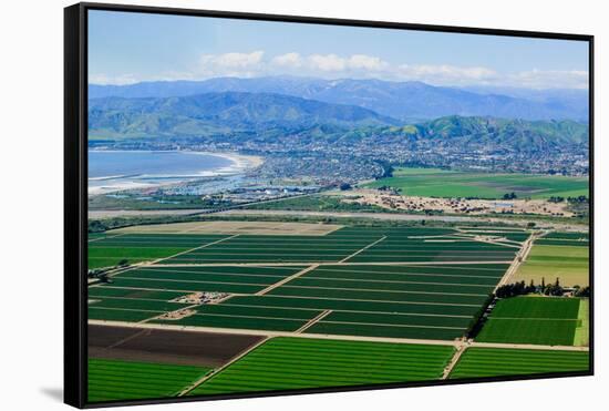 Aerial view of Oxnard farm fields in spring with Ventura City and Pacific Ocean in background, V...-null-Framed Stretched Canvas