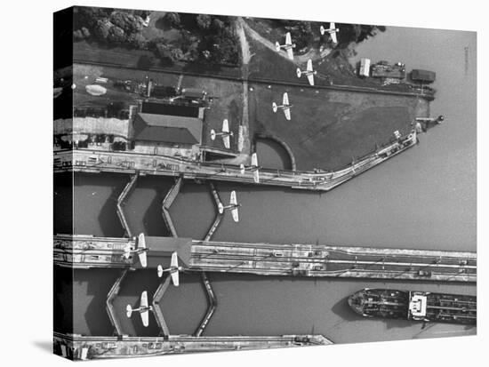 Aerial View of Planes Flying over the Panama Canal-Thomas D^ Mcavoy-Stretched Canvas