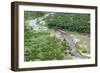 Aerial view of river, African Elephants (Loxodonta africana) and tourist lodge, Botswana-Jean Hosking-Framed Photographic Print