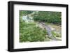 Aerial view of river, African Elephants (Loxodonta africana) and tourist lodge, Botswana-Jean Hosking-Framed Photographic Print