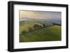 Aerial view of rolling countryside at dawn on a hazy summer day, Devon, England-Adam Burton-Framed Photographic Print