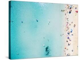 Aerial View of Sandy Beach with Tourists Swimming in Beautiful Clear Sea Water-paul prescott-Stretched Canvas