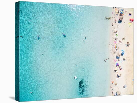 Aerial View of Sandy Beach with Tourists Swimming in Beautiful Clear Sea Water-paul prescott-Stretched Canvas