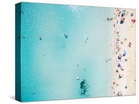 Aerial View of Sandy Beach with Tourists Swimming in Beautiful Clear Sea Water-paul prescott-Stretched Canvas