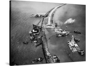Aerial View of Ships Building a Dyke-null-Stretched Canvas