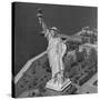 Aerial View of Statue of Liberty from Helicopter-null-Stretched Canvas