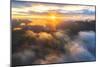 Aerial view of sun rays at sunset lighting up the clouds over Romsdalen valley-Roberto Moiola-Mounted Photographic Print