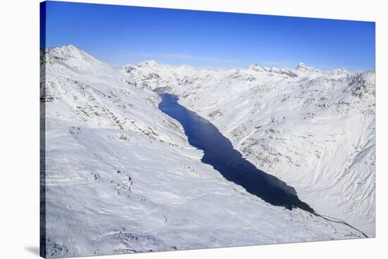 Aerial View of the Alpine Lago Di Lei Surrounded by Snow, Val Di Lei, Chiavenna-Roberto Moiola-Stretched Canvas