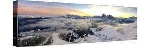 Aerial view of the snowcapped Sassolungo and Sassopiatto mountains at dawn, Seiser Alm-Roberto Moiola-Stretched Canvas