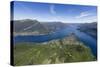 Aerial View of the Village of Bellagio Frames by the Blue Water of Lake Como on a Sunny Spring Day-Roberto Moiola-Stretched Canvas