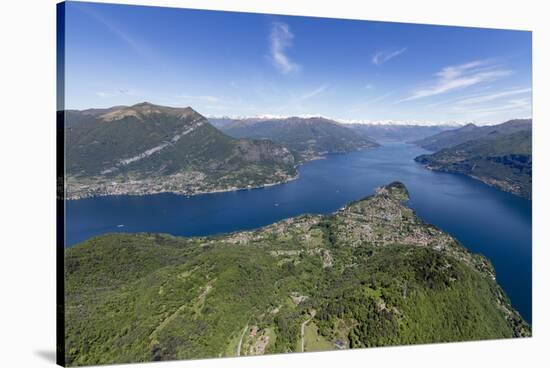 Aerial View of the Village of Bellagio Frames by the Blue Water of Lake Como on a Sunny Spring Day-Roberto Moiola-Stretched Canvas