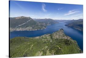 Aerial View of the Village of Bellagio Frames by the Blue Water of Lake Como on a Sunny Spring Day-Roberto Moiola-Stretched Canvas