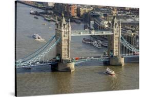 Aerial view of Tower Bridge and River Thames, London, England, United Kingdom, Europe-Charles Bowman-Stretched Canvas