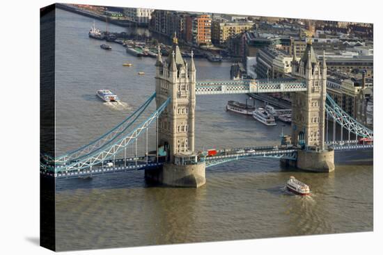 Aerial view of Tower Bridge and River Thames, London, England, United Kingdom, Europe-Charles Bowman-Stretched Canvas