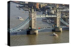 Aerial view of Tower Bridge and River Thames, London, England, United Kingdom, Europe-Charles Bowman-Stretched Canvas