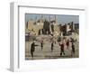 Afghan Boys Play Soccer Near a Mosque and Ruined Buildings During the Early Morning-null-Framed Photographic Print