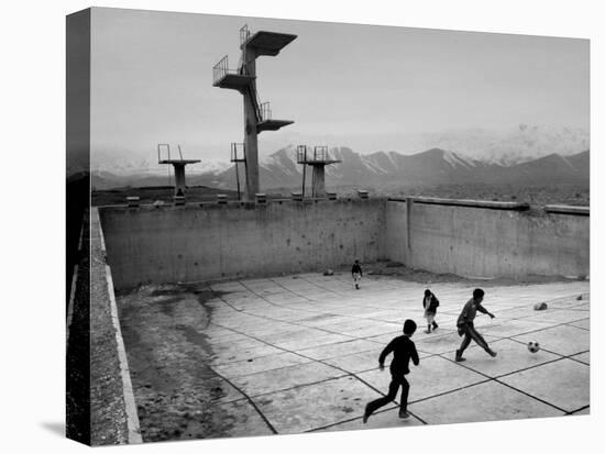 Afghan Boys Play Soccer-null-Stretched Canvas