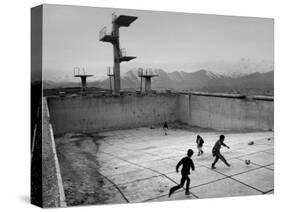 Afghan Boys Play Soccer-null-Stretched Canvas