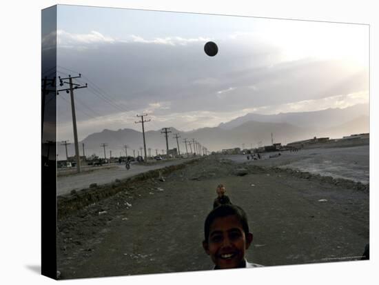 Afghan Boys Play with a Ball in Kabul, Afghanistan, Friday, July 7, 2006-Rodrigo Abd-Stretched Canvas