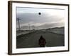 Afghan Boys Play with a Ball in Kabul, Afghanistan, Friday, July 7, 2006-Rodrigo Abd-Framed Photographic Print