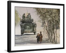 Afghan Boys Walk Along a Path While International Security Assistance Force (Isaf)-null-Framed Photographic Print