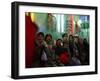 Afghan Boys Watch a Movie on a Television, Unseen, as They Eat Ice Cream at an Ice Cream Shop-Rodrigo Abd-Framed Photographic Print