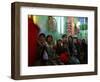 Afghan Boys Watch a Movie on a Television, Unseen, as They Eat Ice Cream at an Ice Cream Shop-Rodrigo Abd-Framed Photographic Print