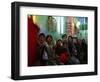 Afghan Boys Watch a Movie on a Television, Unseen, as They Eat Ice Cream at an Ice Cream Shop-Rodrigo Abd-Framed Photographic Print