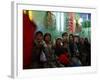 Afghan Boys Watch a Movie on a Television, Unseen, as They Eat Ice Cream at an Ice Cream Shop-Rodrigo Abd-Framed Photographic Print