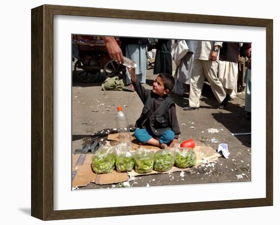 Afghan Child 5, Receives a Bottle of Water-Musadeq Sadeq-Framed Photographic Print