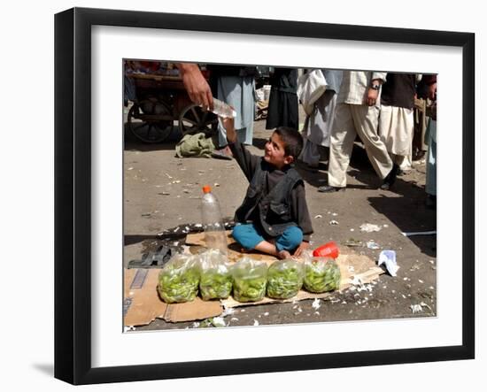 Afghan Child 5, Receives a Bottle of Water-Musadeq Sadeq-Framed Photographic Print