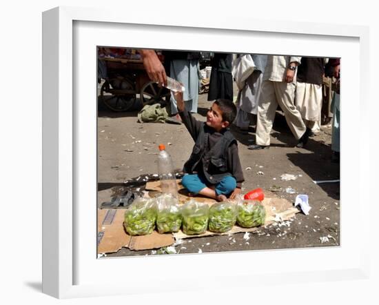 Afghan Child 5, Receives a Bottle of Water-Musadeq Sadeq-Framed Photographic Print