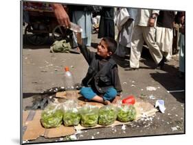 Afghan Child 5, Receives a Bottle of Water-Musadeq Sadeq-Mounted Photographic Print