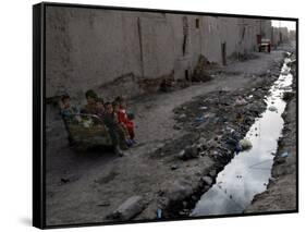 Afghan Children Sit Together Aboard an Old Cart-null-Framed Stretched Canvas