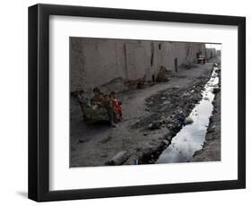Afghan Children Sit Together Aboard an Old Cart-null-Framed Photographic Print