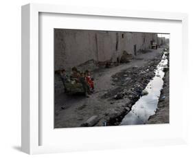 Afghan Children Sit Together Aboard an Old Cart-null-Framed Photographic Print