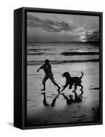 Afghan Dog Roaming across Beach with Girl at Sundown, During Preparation for Westminister Show-George Silk-Framed Stretched Canvas