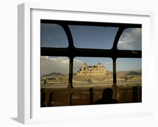 Afghan Drives Past the Darul Aman's Palace in the City of Kabul, Afghanistan-null-Framed Photographic Print