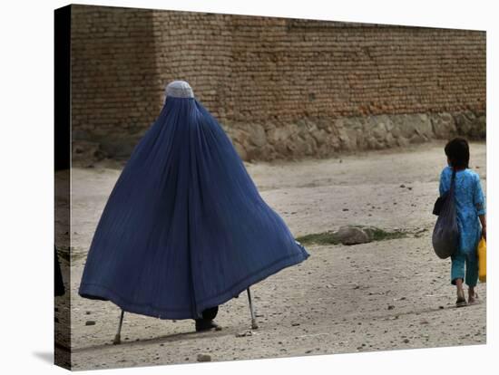 Afghan Girl Carries the Ration of Her Mother, a Victim of Land Mines, in Kabul, Afghanistan-null-Stretched Canvas