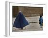 Afghan Girl Carries the Ration of Her Mother, a Victim of Land Mines, in Kabul, Afghanistan-null-Framed Photographic Print