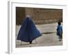 Afghan Girl Carries the Ration of Her Mother, a Victim of Land Mines, in Kabul, Afghanistan-null-Framed Photographic Print