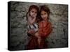 Afghan Girl Holds Her Younger Sister in Nangarhar Province, East of Kabul, Afghanistan-null-Stretched Canvas