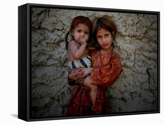 Afghan Girl Holds Her Younger Sister in Nangarhar Province, East of Kabul, Afghanistan-null-Framed Stretched Canvas