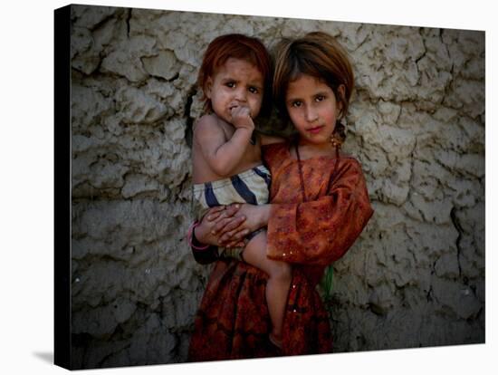 Afghan Girl Holds Her Younger Sister in Nangarhar Province, East of Kabul, Afghanistan-null-Stretched Canvas