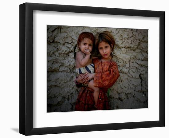 Afghan Girl Holds Her Younger Sister in Nangarhar Province, East of Kabul, Afghanistan-null-Framed Photographic Print