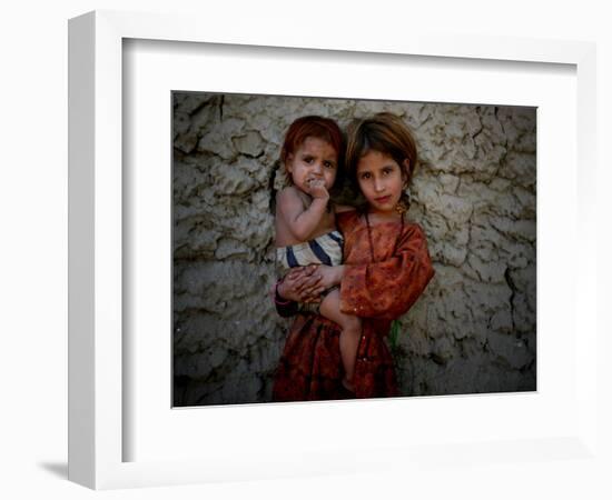 Afghan Girl Holds Her Younger Sister in Nangarhar Province, East of Kabul, Afghanistan-null-Framed Photographic Print